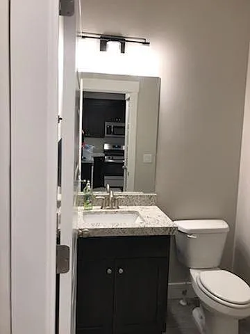 1/2 bath off kitchen