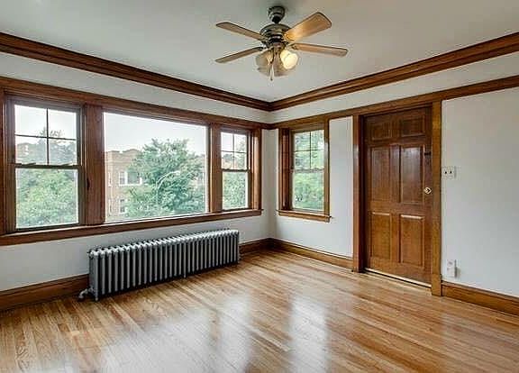 beautiful wood detailing and hardwood throughout