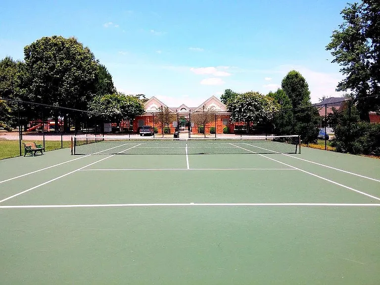 Community Tennis Court next to the Community Pool