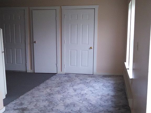 Taken at the corner of the living room. The door to the righ