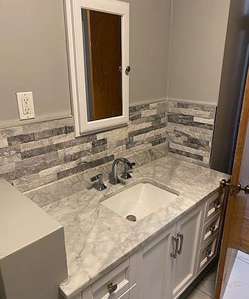 vanity and sink in master bathroom