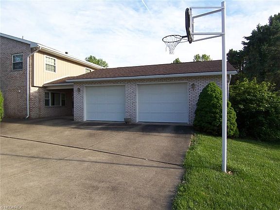 2 car garage with parking pad