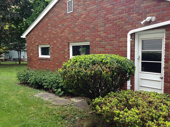 Side entrance with motion detector lighting.