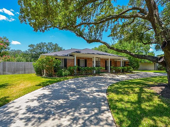 You will love this large lot! When you are in the backyard you feel the peace and serenity of the country, yet you are less than 15 minutes from the Galleria!