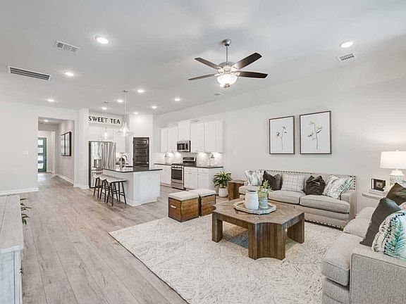Representative Only Kinglet Plan Family Room and Kitchen