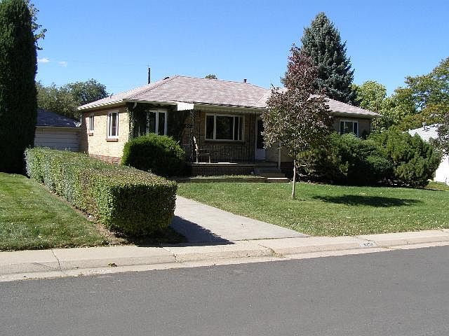 Front of house. Two car garage behind house - enter driveway from street. Full fenced back yard. Sprinkler system.