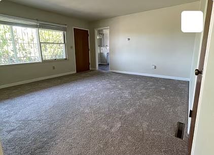 Living room looking towards the front door.