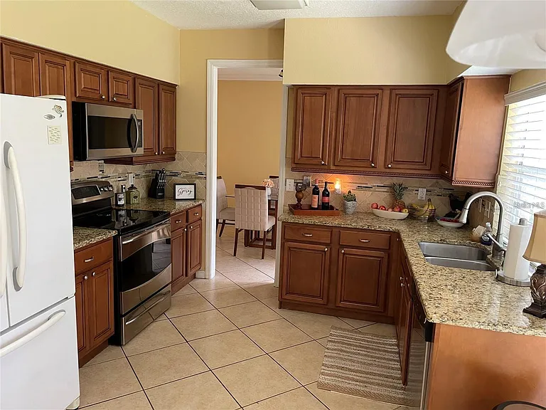 KITCHEN WAS REMONDELED IN 2017 WITH GRANITE COUNTERS AND NEWER APPLIANCES