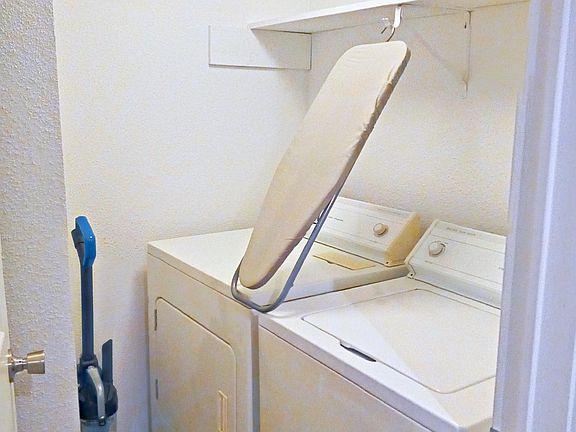 Laundry Room is next to the kitchen.