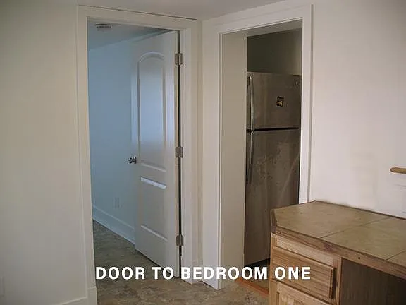 Door to bedroom 1.