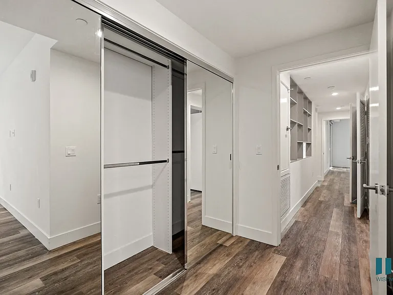 Bedroom with Large Mirrored Closets
