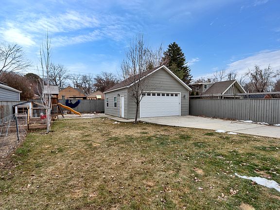 Backyard and two-car garage