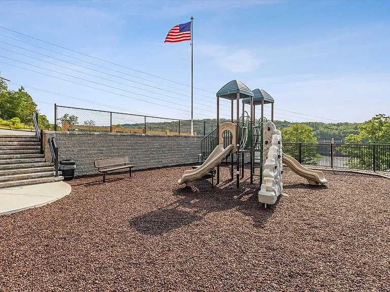 Sunny playground with benches.