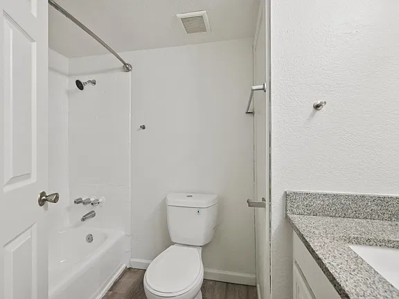 Representative apartment bathroom at Cornell Apartments.