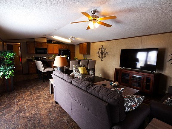 your home has central air a very large living area open to t