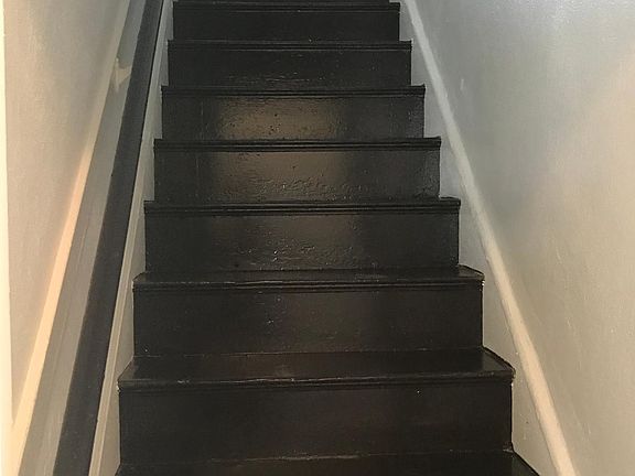 Stairway to upstairs bedrooms and bathroom