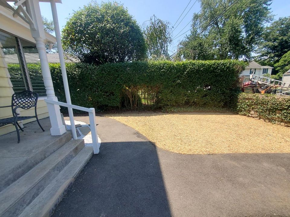 front yard with hayed new grass area coming in