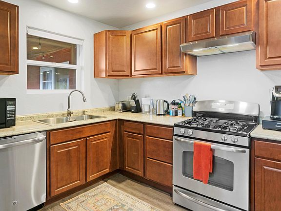 Full kitchen with stainless steel appliances