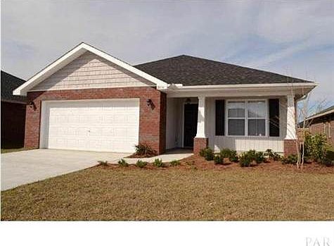 A VIEW FROM THE STREET. THIS PHOTO OF THE SAME PLAN ON A DIFFERT LOT. ACTUAL FEATURES AND COLORS MAY VARY