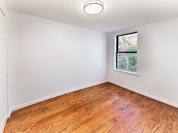 5th image of 162 E 2nd St APT 3C