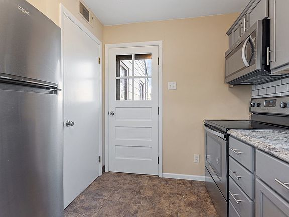 View of back door from the kitchen.