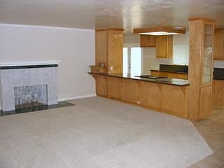 living room is open to kitchen and dining room