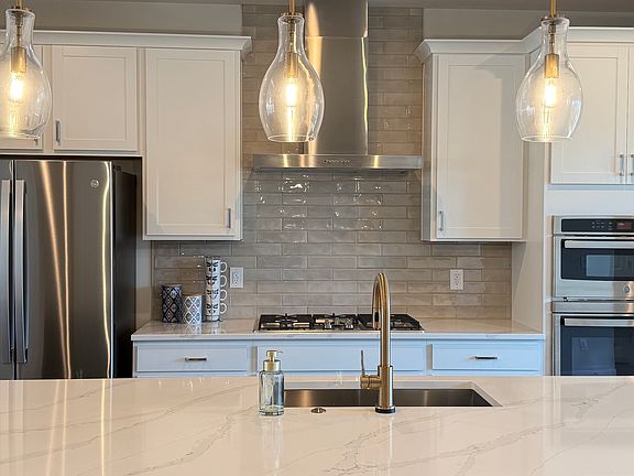 Top-of-the-line stainless appliances and custom cabinetry.