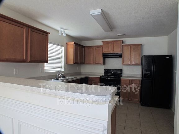 4th image of 11701 Village Pond Dr