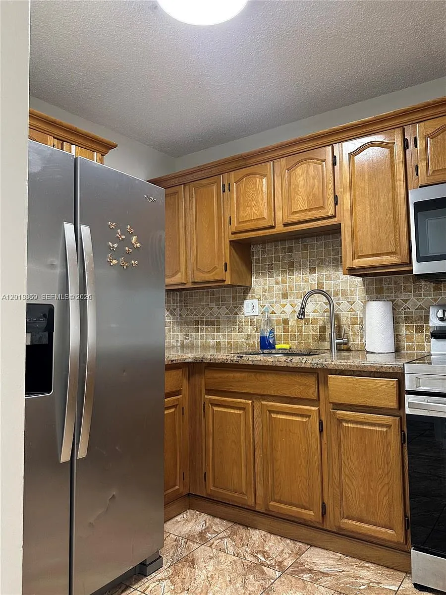 Building Photo - 2780 W 76th St #203
