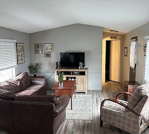 Living area and front door.