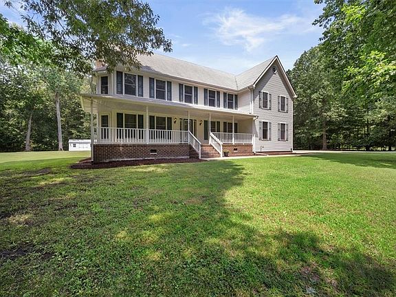Spacious home offers over 3.3 Acres of land. 