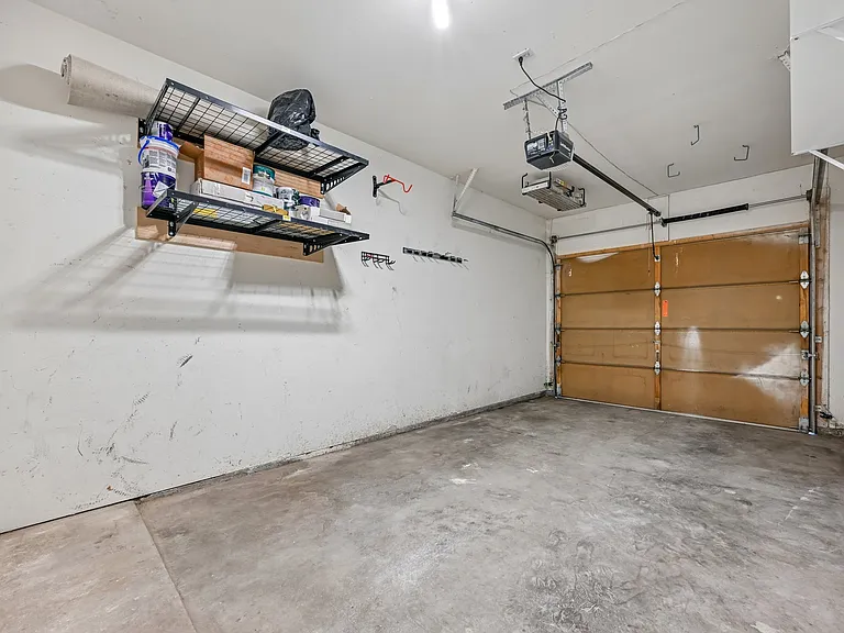 Single car garage with storage.