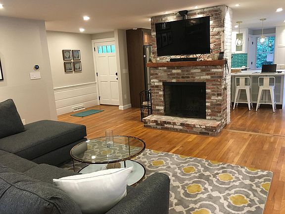 Living room, fireplace, entry, kitchen
