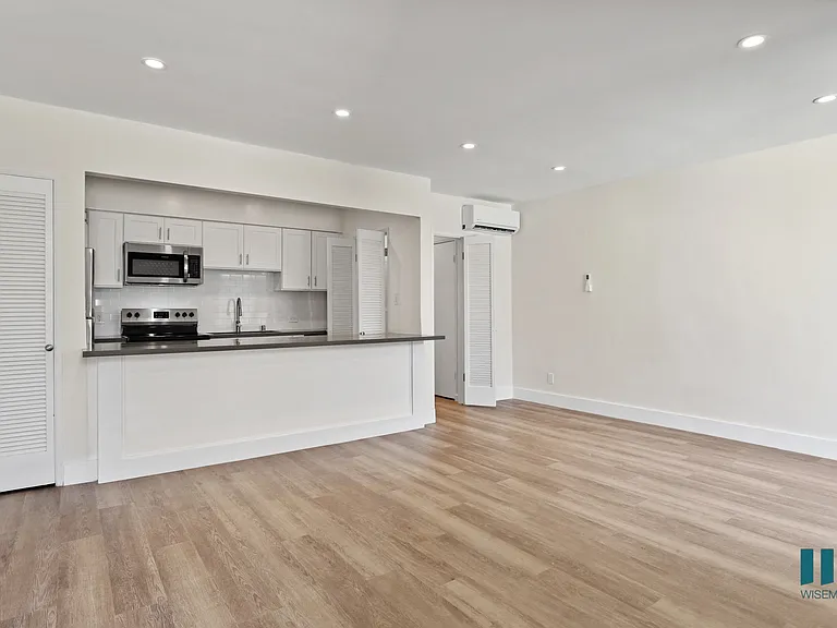 Open-Concept Kitchen, Dining, and Living Room Areas