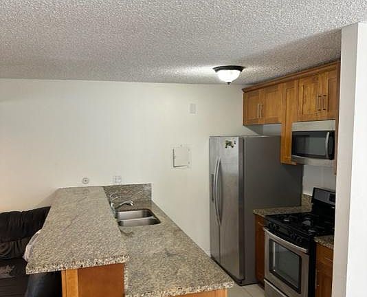 2nd image of 18620 Hatteras St Unit 208