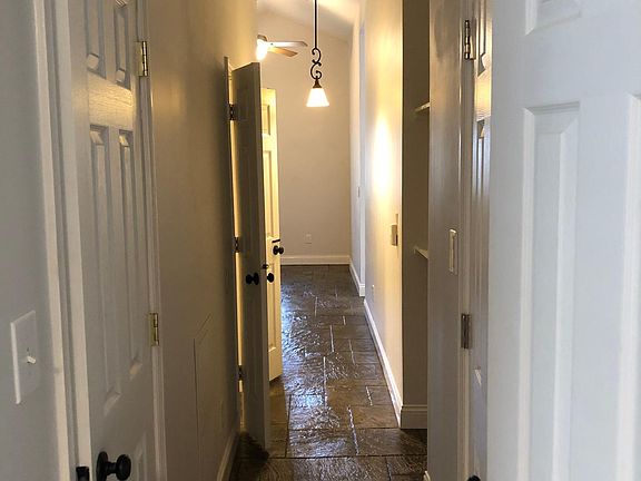 Hall, facing kitchen (closets on left and right).