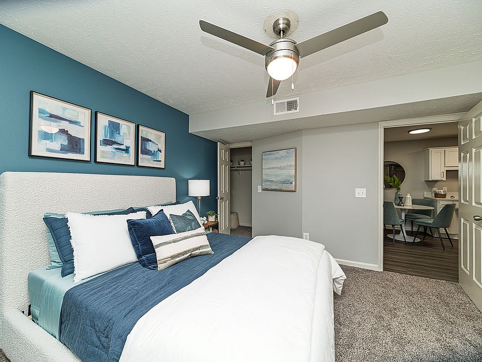Bedroom with carpet & ceiling fan