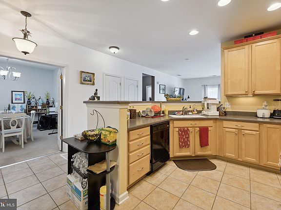 5th image of 9710 Handerson Pl Unit 203