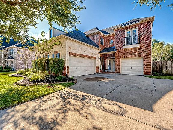 The home sits on an oversized, 16,000(+) sf lot! Split garages and lots of driveway space.