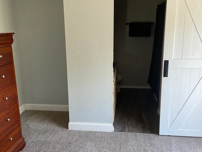 Master bathroom entrance from bedroom.