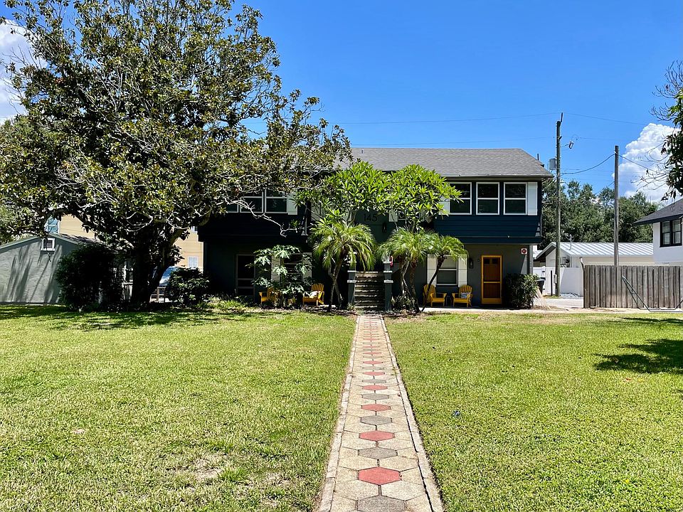 Large front yard. The apartment available is the top left. The other 2 units are leased. Downstairs tenant has a dog.