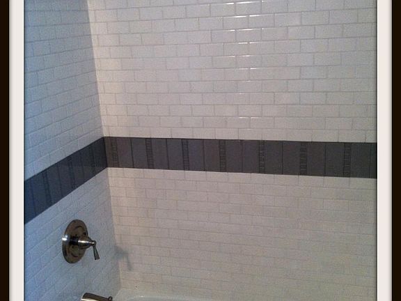 Glass tile full shower.