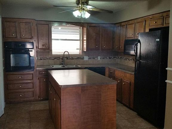 Kitchen with island and lots of storage