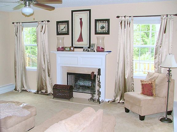 Sunken Living Room with Beautiful Fireplace