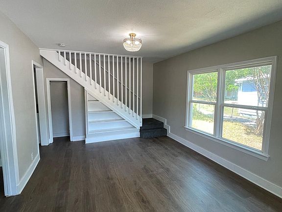 Entry living area, with stair access to second floor