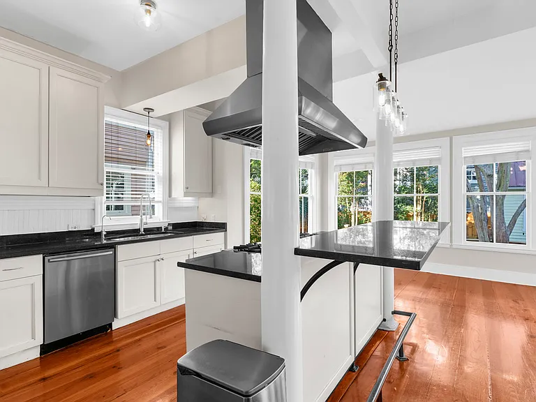 Kitchen with Wolf Gas Stove & Two Ovens and Dishwasher
