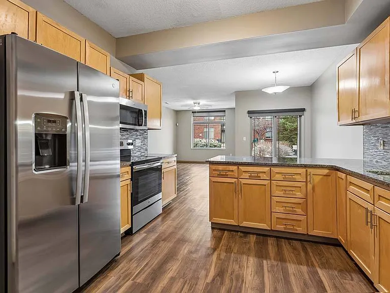 A spacious kitchen designed for easy movement, modern cooking, and everyday moments that feel effortless.