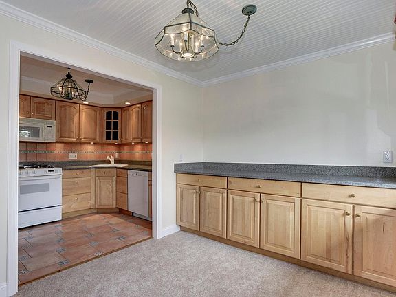 Open dining room with extra storage.