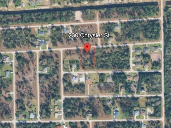 1230 Chrysler St, Lehigh Acres, FL 33974