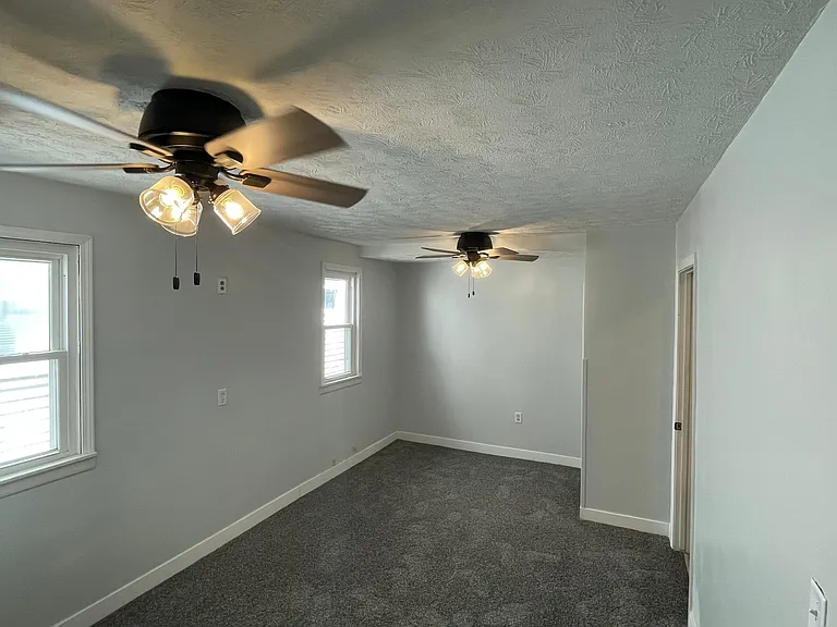 Master bedroom with two closets.